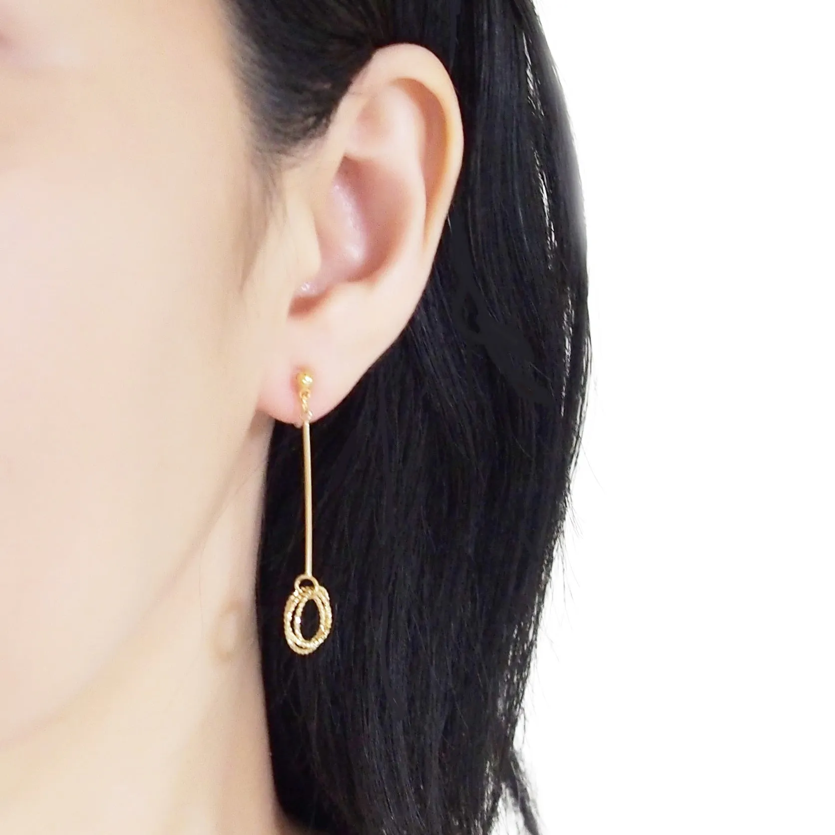 Textured triple hoop clip on earrings ( Gold tone )