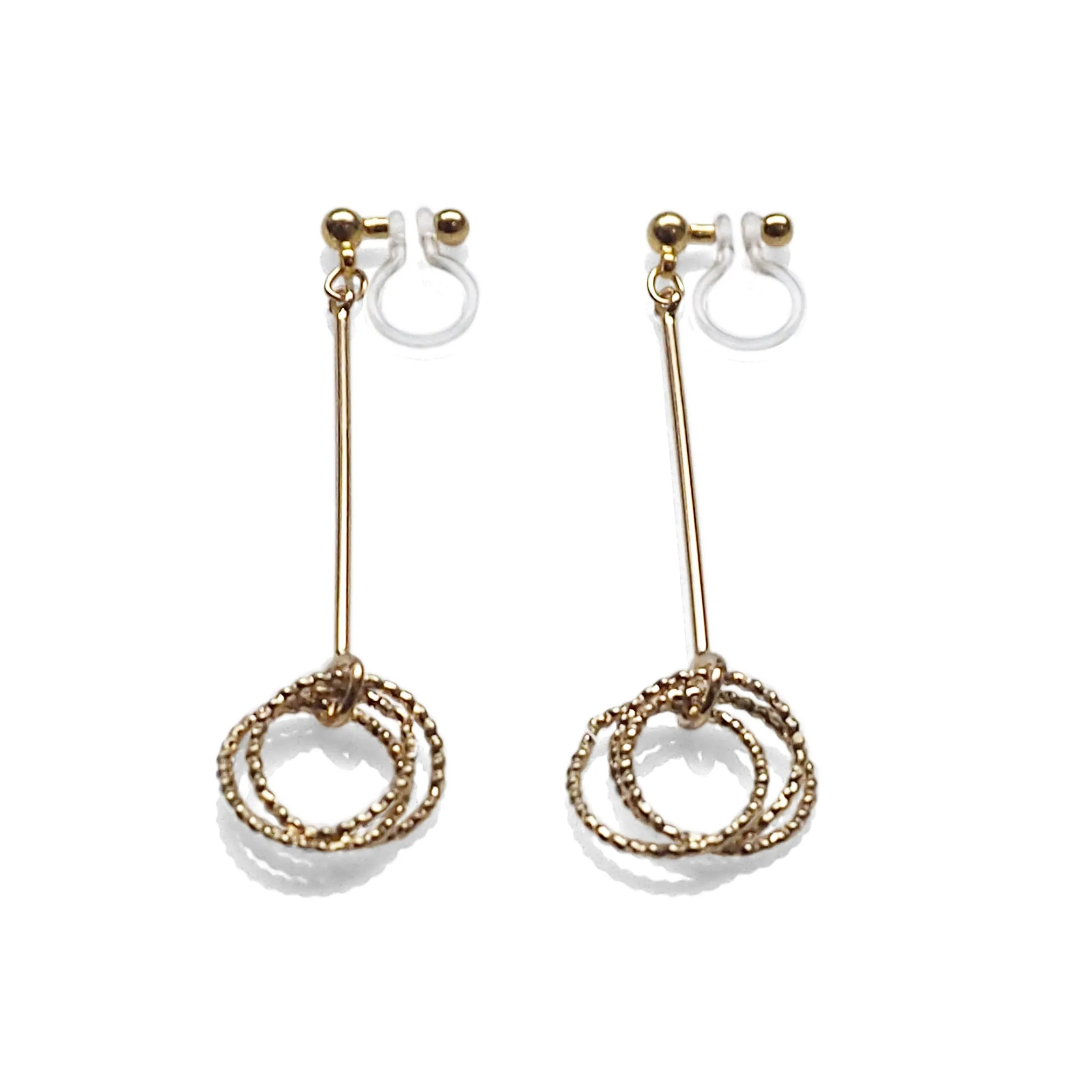 Textured triple hoop clip on earrings ( Gold tone )